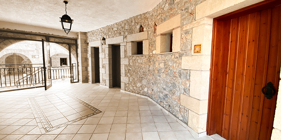 Stone forecourt leading to apartments and studios